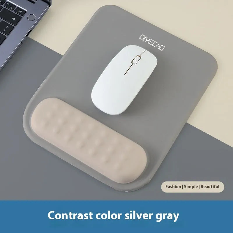 Ergonomic cloth silicone mouse pad with integrated wrist rest in multiple colour options.