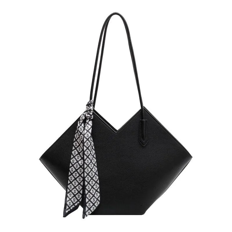 Women's large beige PU shoulder bag with square shape and long strap on a plain background.
