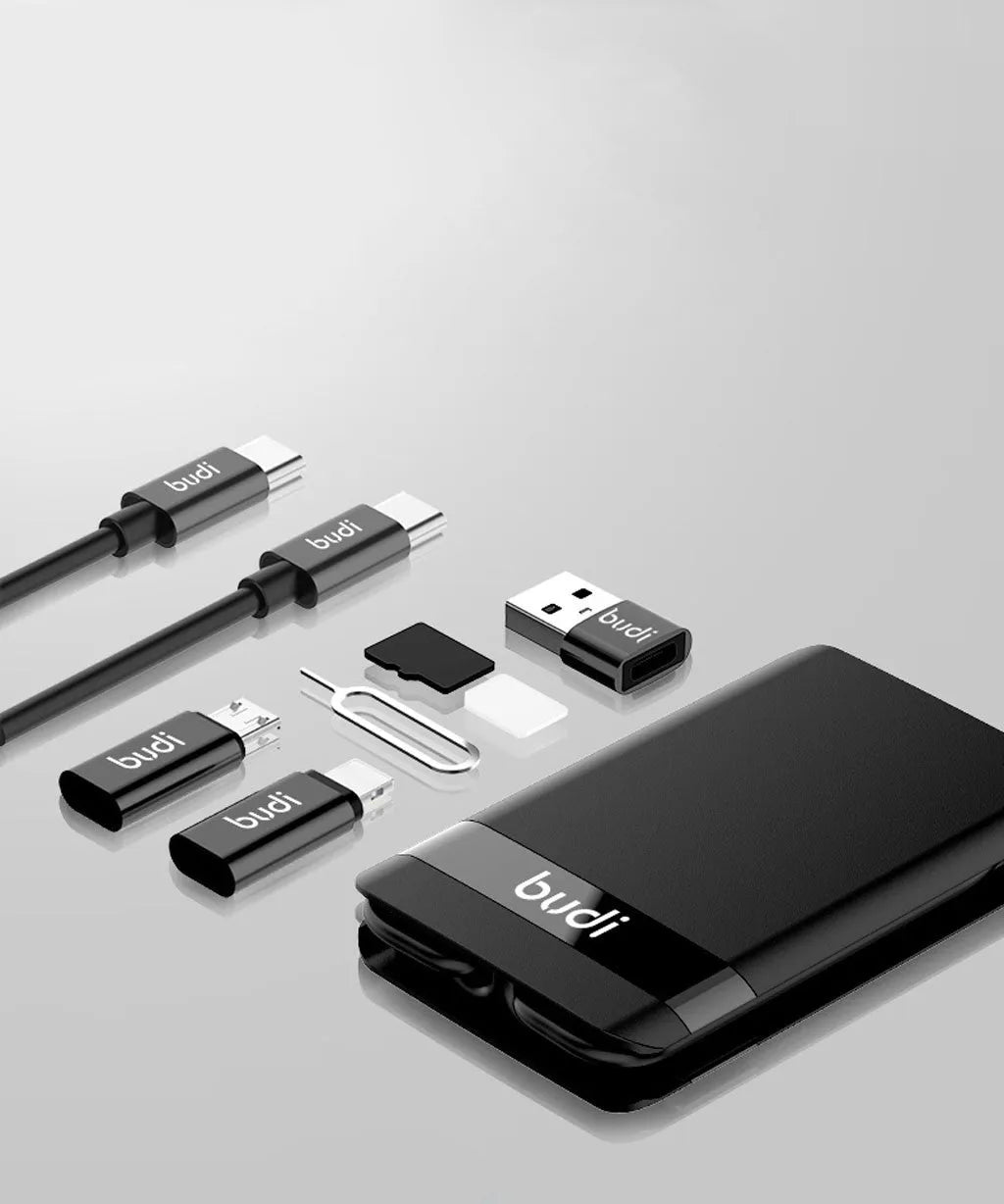 Black digital urban survival card with a short attached cable, conversion head, and slots for TF and nano SIM cards.