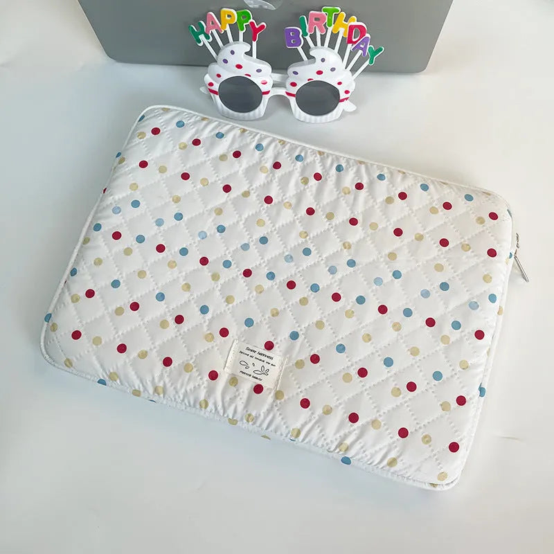 Women's polka dot polyester laptop bag shown in solid colour, suitable for 11-inch to 15.6-inch devices.