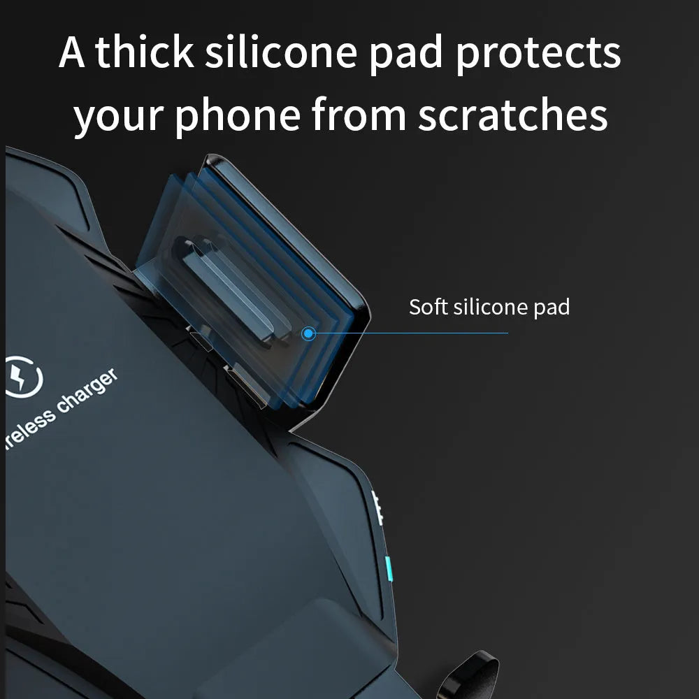 Black wireless car charger with auto-sensing clamp mounted on a car dashboard.