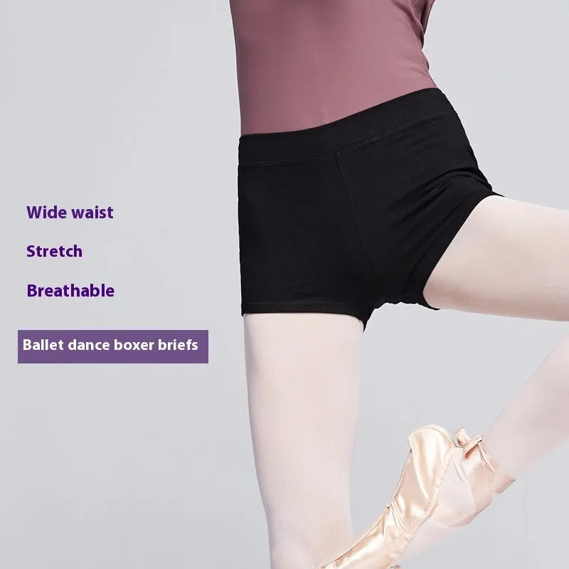 Black cotton ballet practice shorts for women laid flat, showing size label.