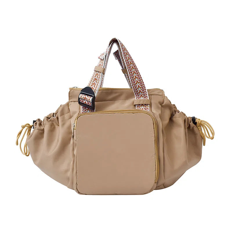 Nylon mommy bag in large capacity tote style, available in multiple colours for travel and daily use