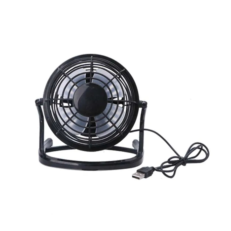 Mini adjustable USB desk fan in black, white, or blue on a workspace next to a laptop.