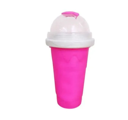 Blue quick refrigeration pinch cup with cylindrical shape and double-layer silicone construction on a table.