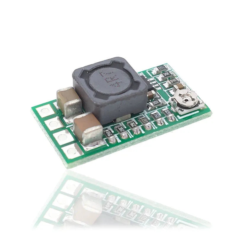 Green circuit board DC-DC power module converting 12-24V to 5V with 3A output capacity