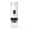 Portable electric capsule coffee machine for car and outdoor travel in silver finish, showing LCD display.