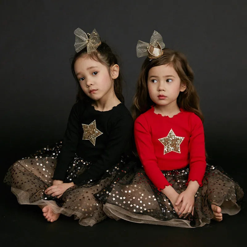 Children's red cotton Christmas princess dress with long sleeves, lace trim, and embroidered star details.