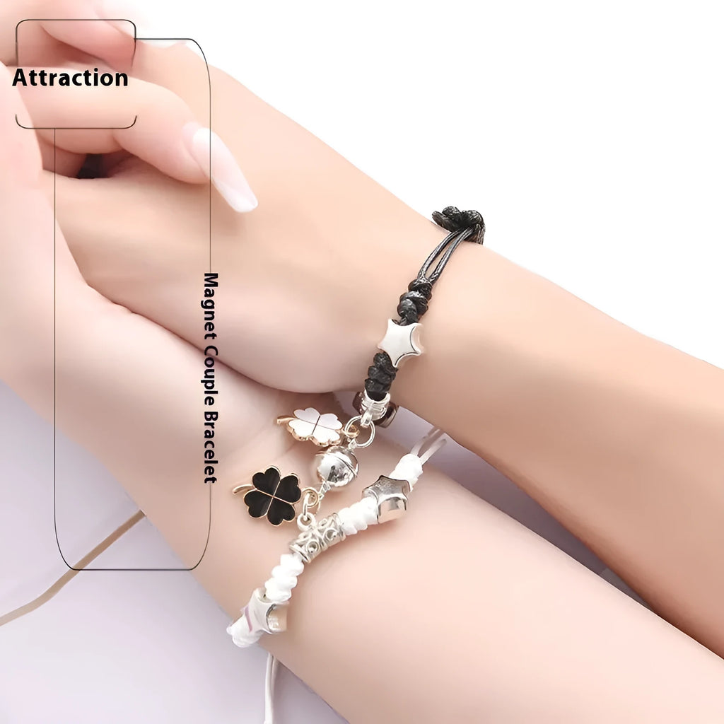 Couple suction bracelet pair showing electroplated alloy construction with crown pendant design