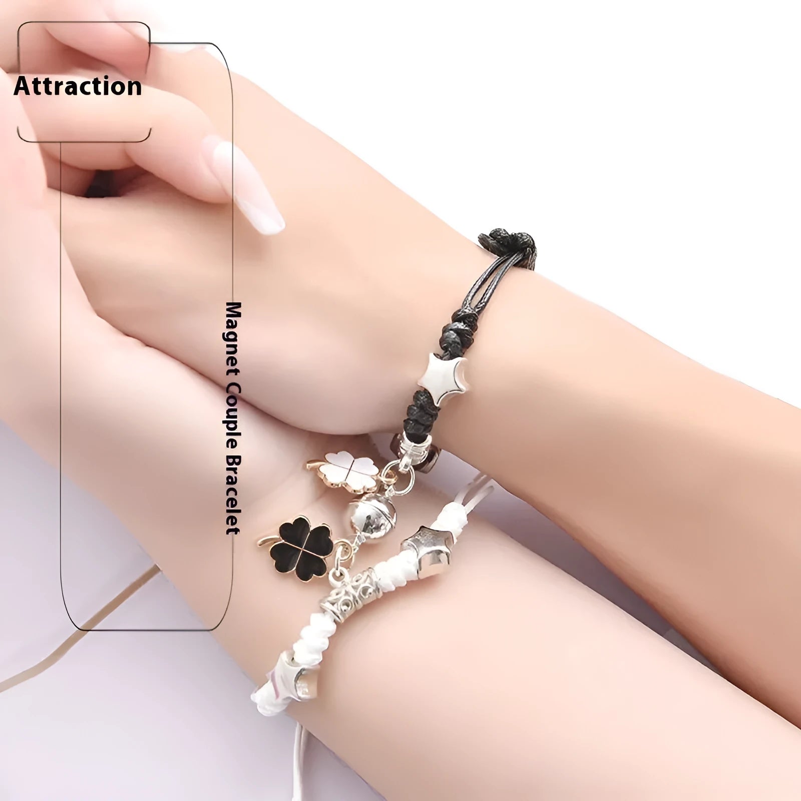 Couple suction bracelet pair showing electroplated alloy construction with crown pendant design