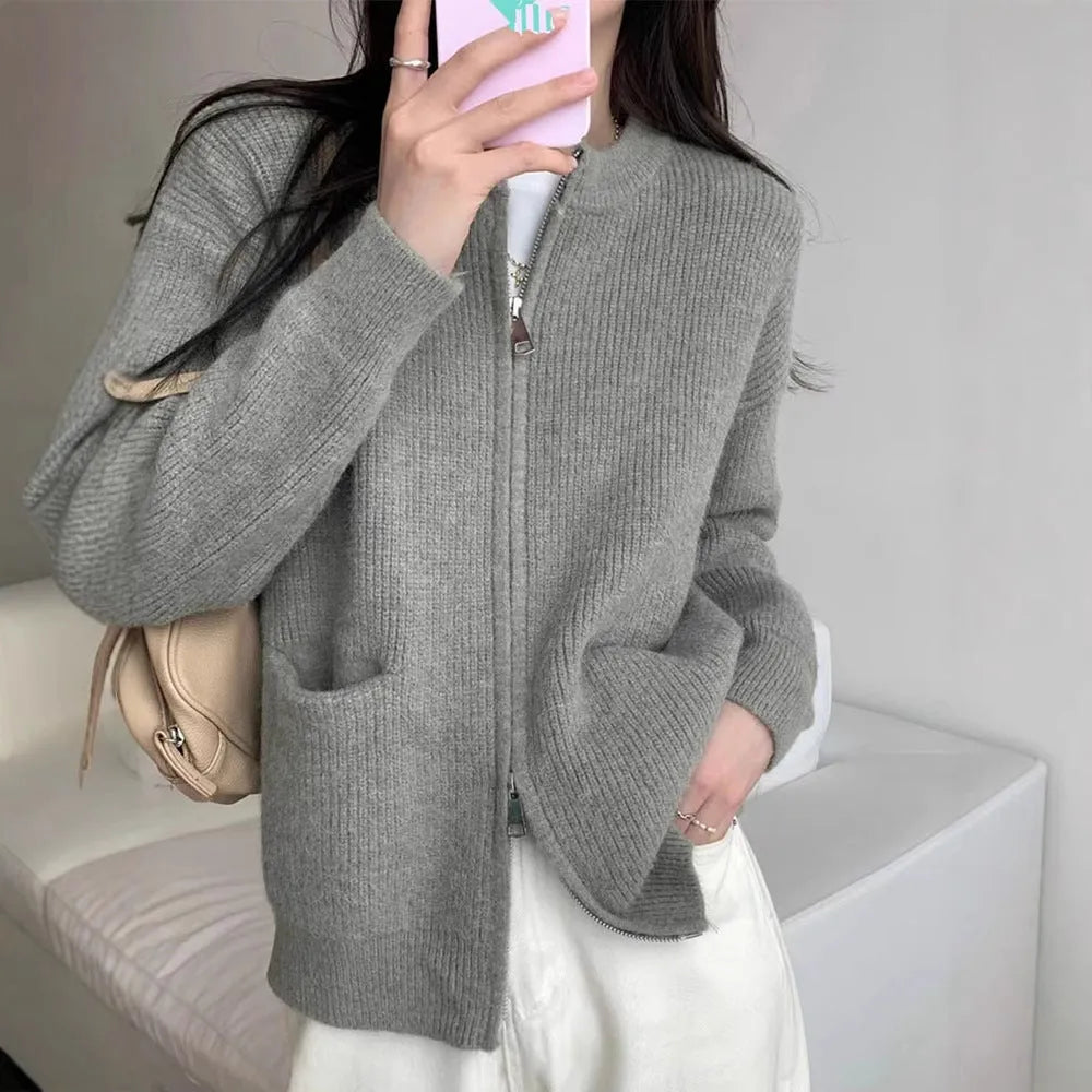 Beige viscose fibre soft sweater coat with long sleeves and open cardigan front.