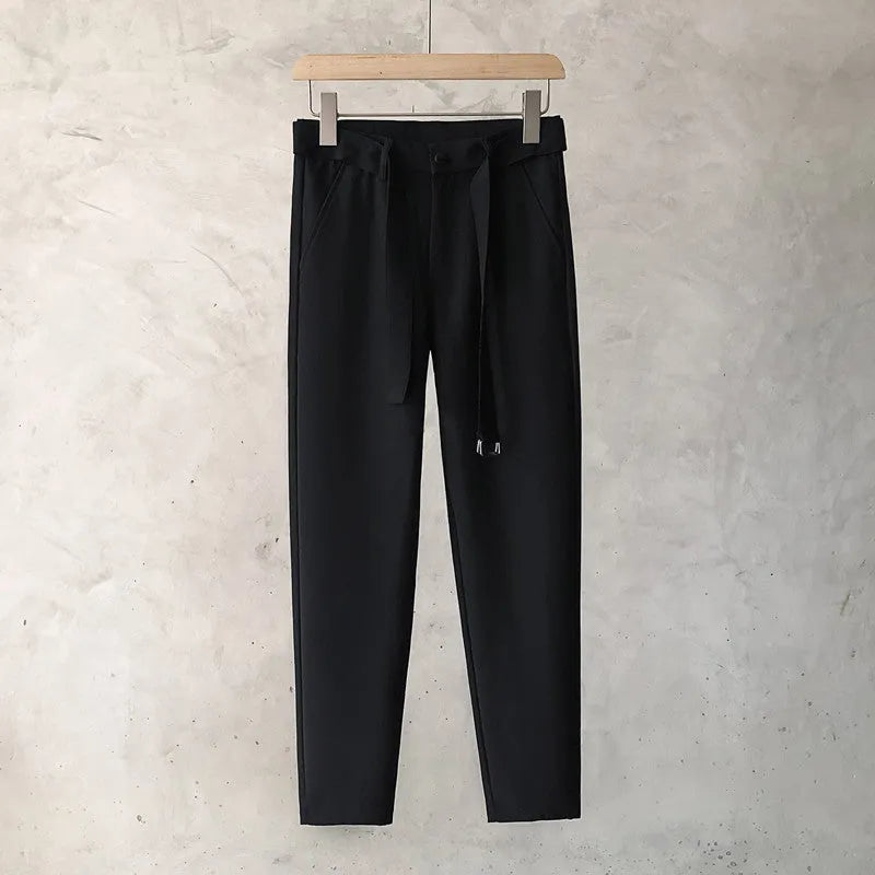 Boys slim straight wool trousers in tapered cut for business casual and street fashion.