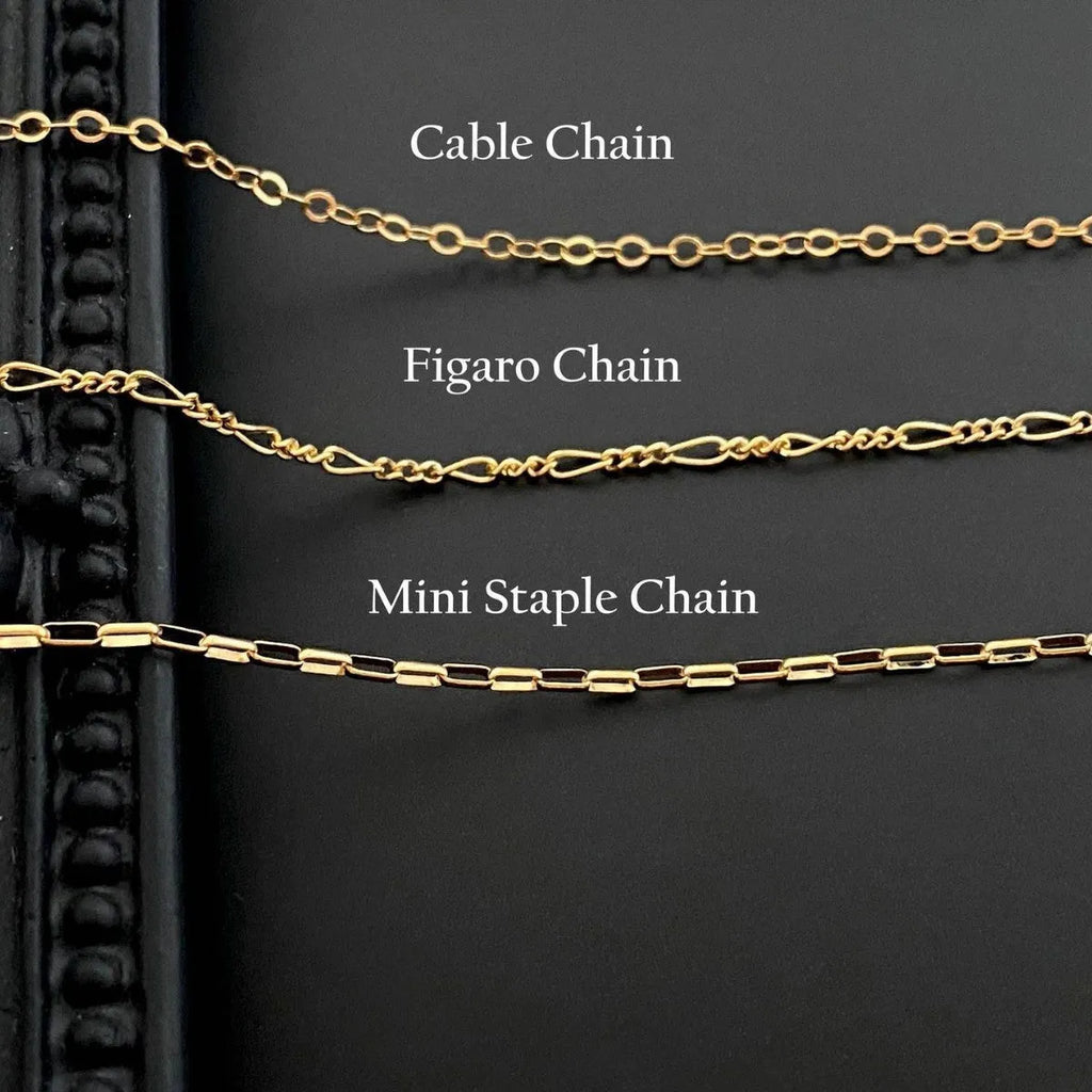 Ghost pendant necklace with titanium steel pendant on a stainless steel chain, showing chain style options.
