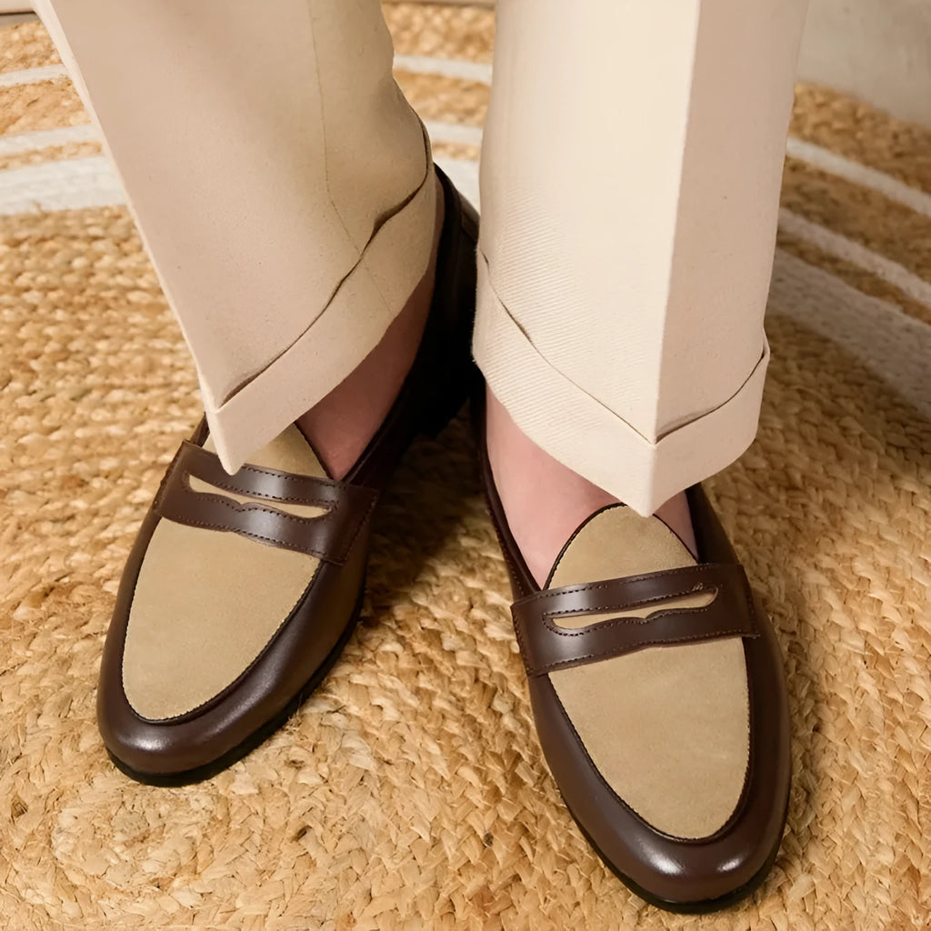Coffee grey men's suede loafers with high-gloss finish and rubber sole on a plain background.