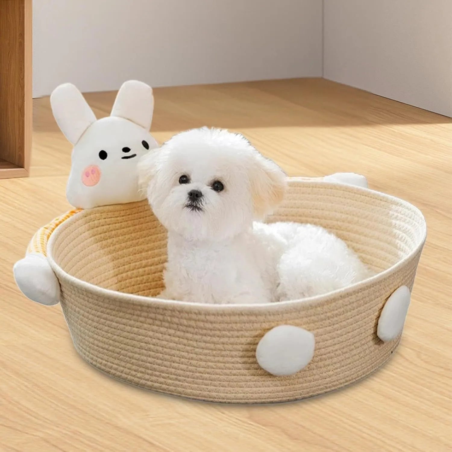 Woven cotton rope cat bed and scratcher basket with rabbit design, shown in three available sizes.