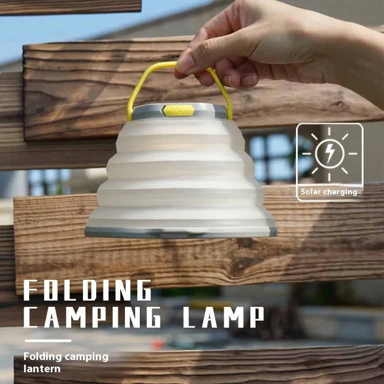 White portable camping lamp with single control button for tent lighting