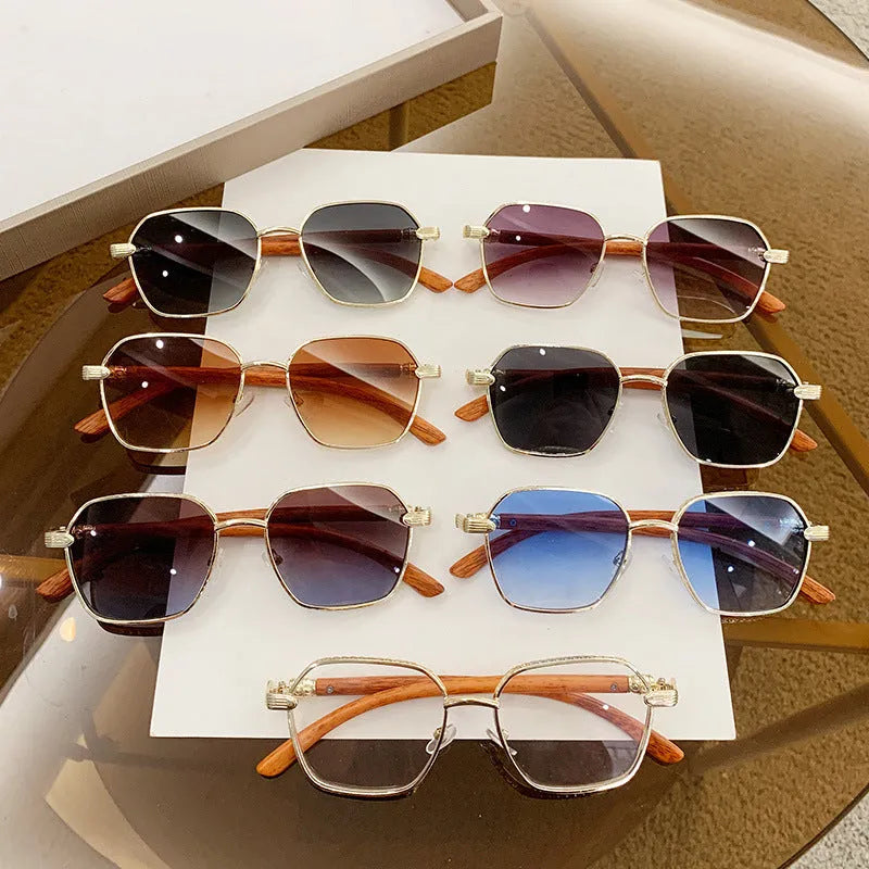 Women's fashion glasses with wood grain detailing on gold alloy frames