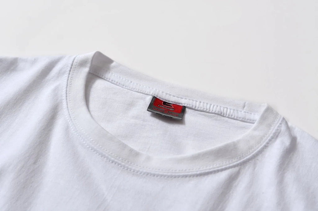 White cotton overalls with round neck and short sleeves in loose pullover style