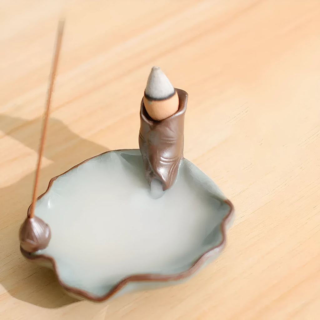 Purple clay ceramic reverse flow incense burner with crystal glaze lotus design