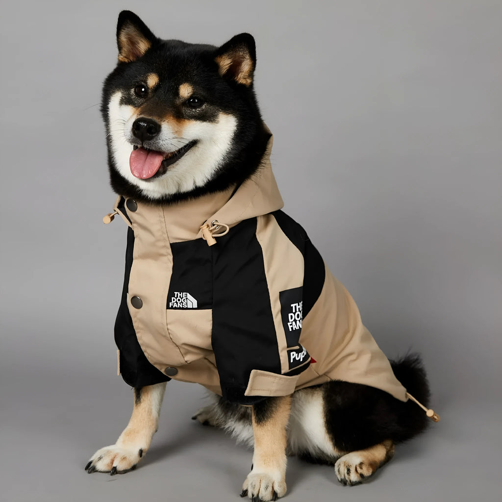 Khaki coloured polyester shell jacket for a dog on a size chart showing S, M, L, XL, 2XL, 3XL, 4XL, and 5XL.