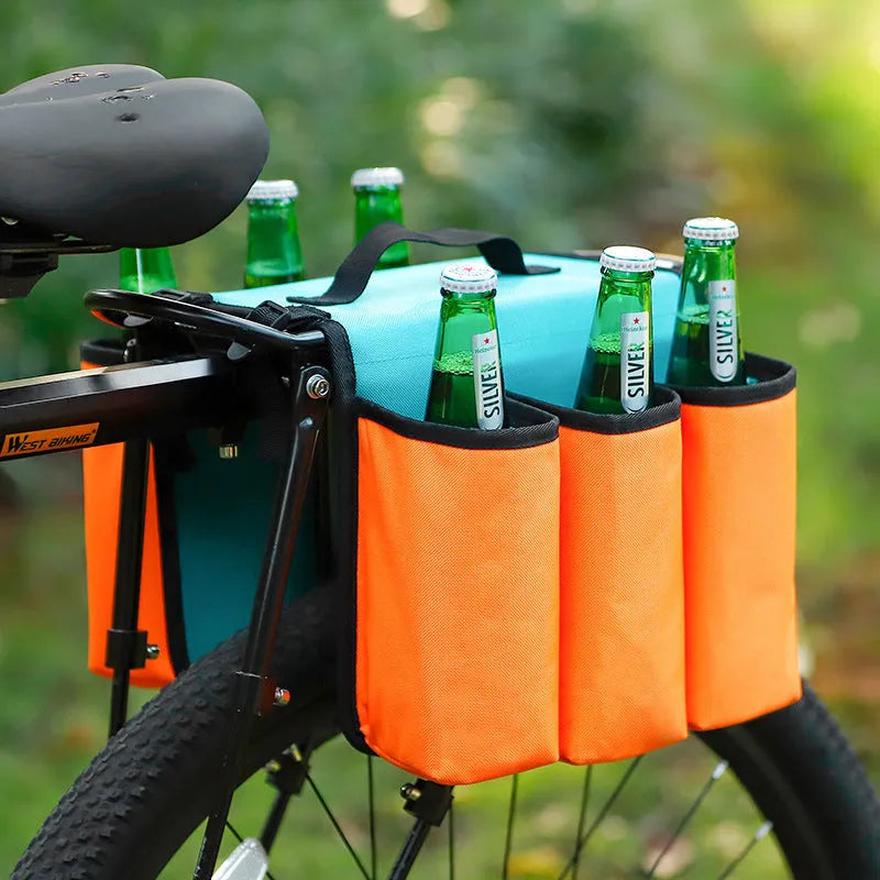 Black double-sided bicycle bag mounted on a bike carrier, showing two compartments.