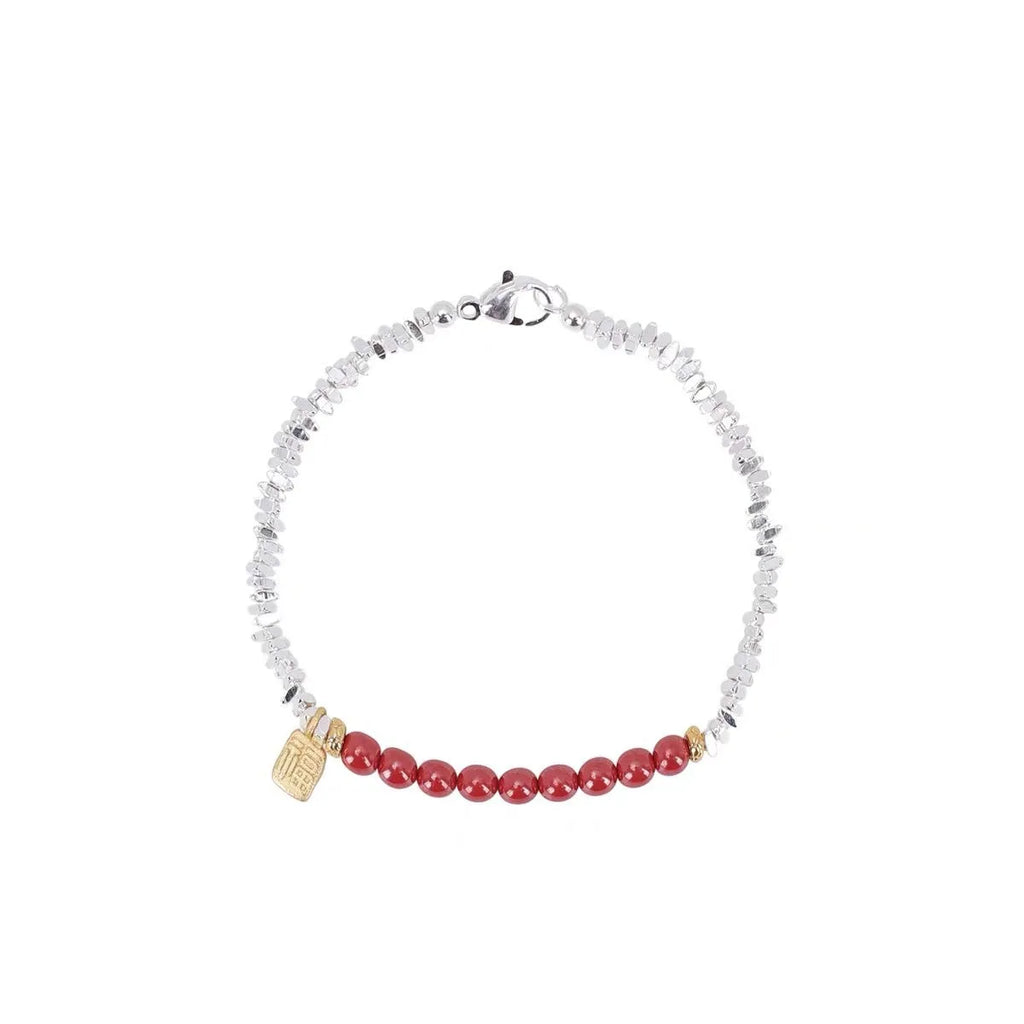Silver electroplated copper lucky beads bracelet with geometric round beads on wrist