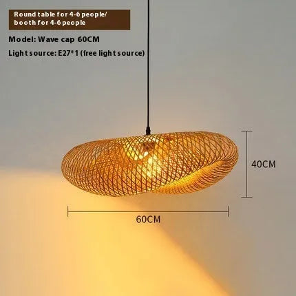 Natural bamboo straw hat-shaped pendant lamp shade hanging from a ceiling, showing its woven texture.