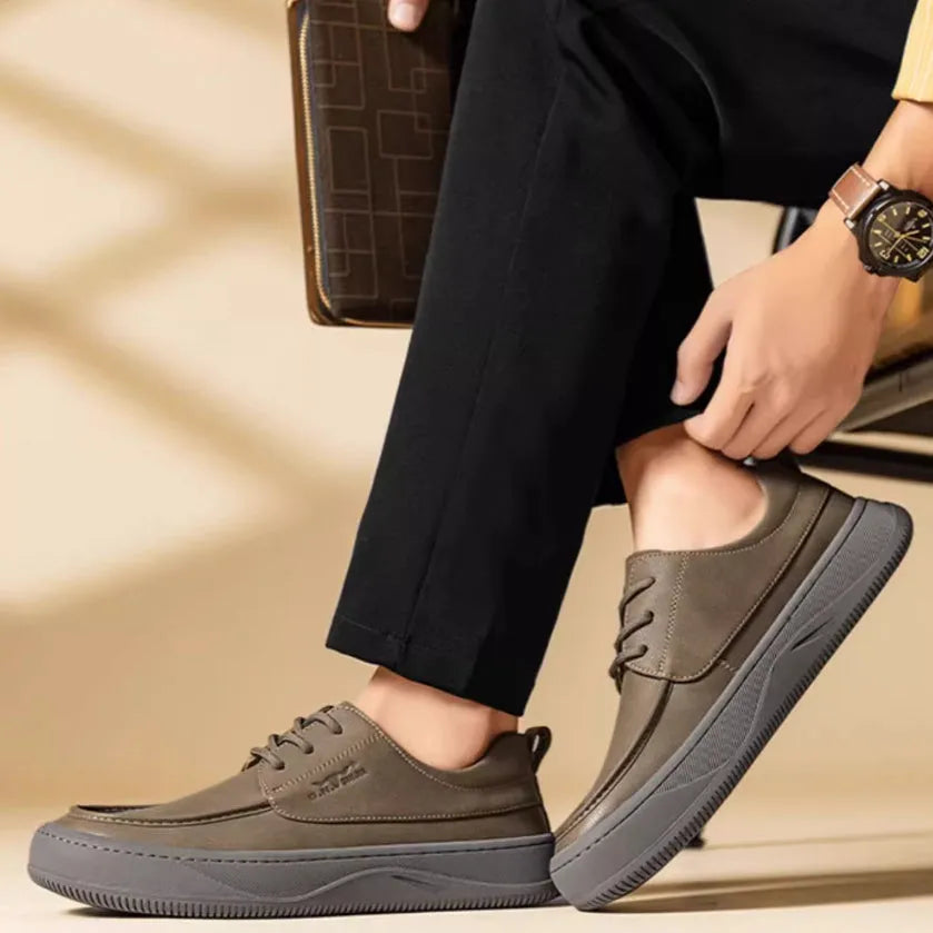 British retro style brown leather casual shoes with big toe design on a white background.