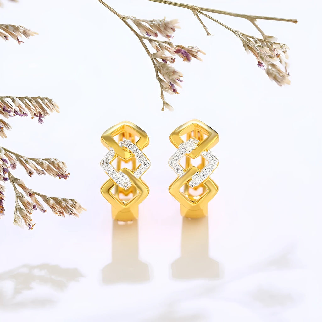 Gold geometric hollow out alloy earrings with ear clip fastening shown from front angle