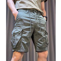 Loose straight-leg Korean-style overalls pants in khaki with multiple pockets and an elasticated waist.
