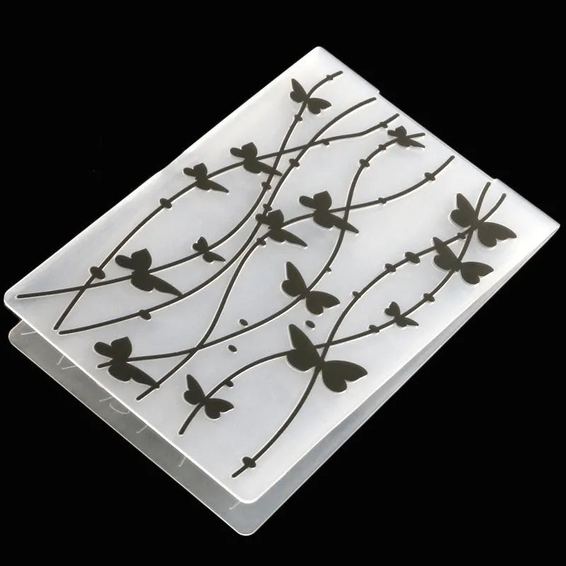 Plastic cake decorating mould with windmill design measuring 14.5 by 10.5 centimetres
