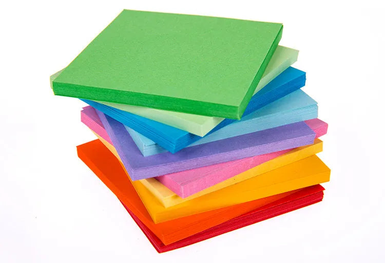 Assorted colourful mini paper scrolls with metal eyelets, shown in 3x7cm, 4x7cm and 5x5cm sizes