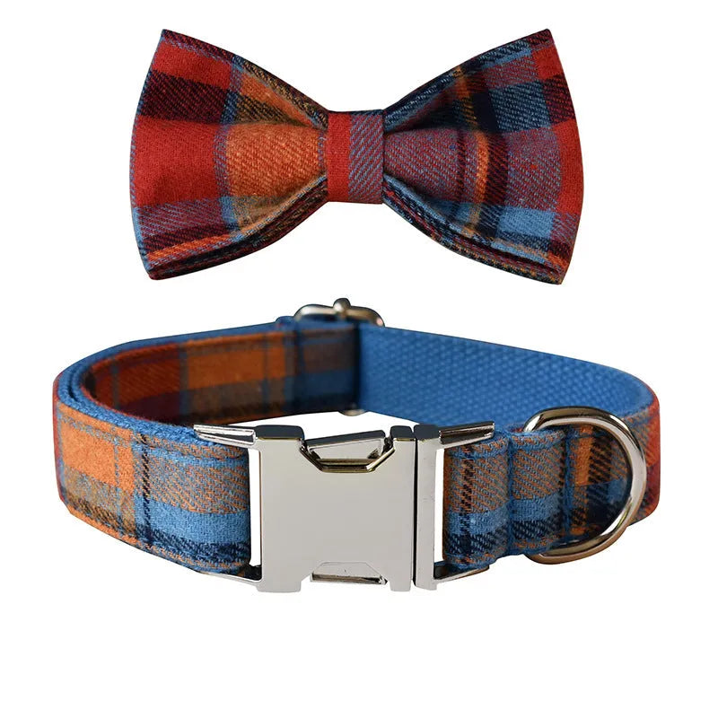 Blue velvet plaid cotton dog collar with alloy buckle and bow accessory on white background
