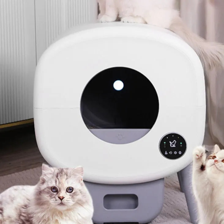 Automatic self-cleaning cat litter box made of white ABS plastic with control panel.