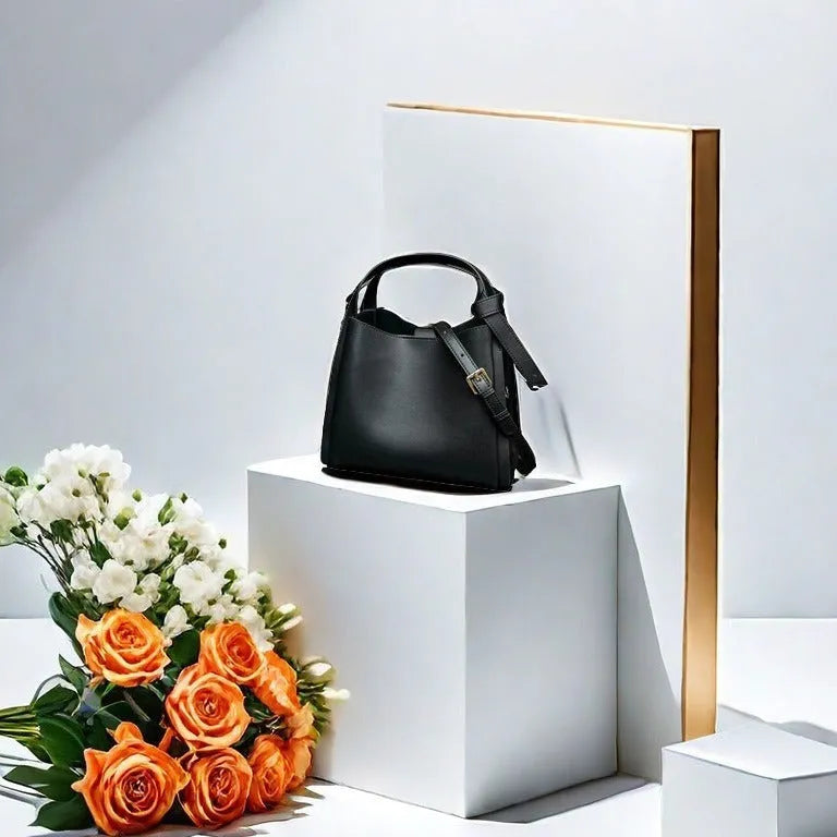 Women's soft cowhide genuine leather crossbody shoulder bag in a bucket shape.