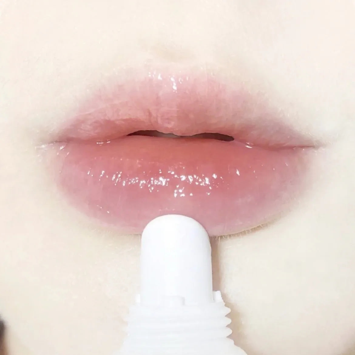 Moisturising honey lip gloss in transparent custard and jelly options for universal skin types