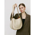 Designer small crossbody bag for women in genuine top grain leather with retro splicing detail