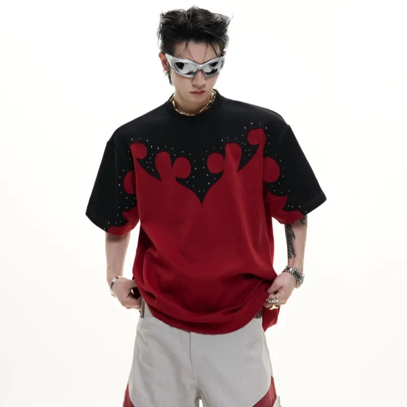 Men's grey cotton t-shirt with burnt flower embroidery and rhinestone details on the front.