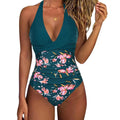 Women's printed one-piece bikini swimsuit with lace-up back in a floral pattern.