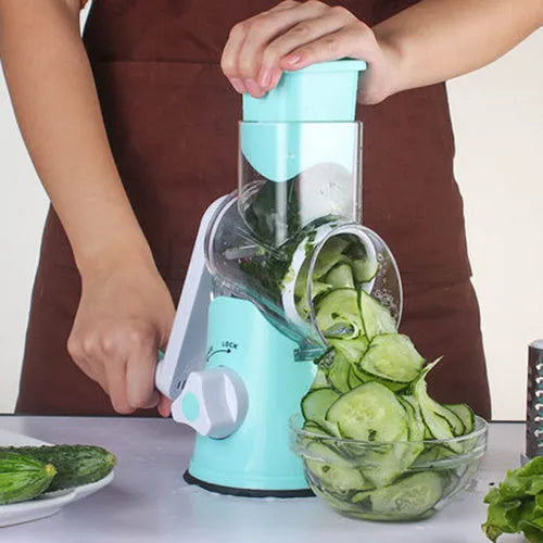 Manual kitchen mandoline slicer with round stainless steel blade in blue, green or red colours
