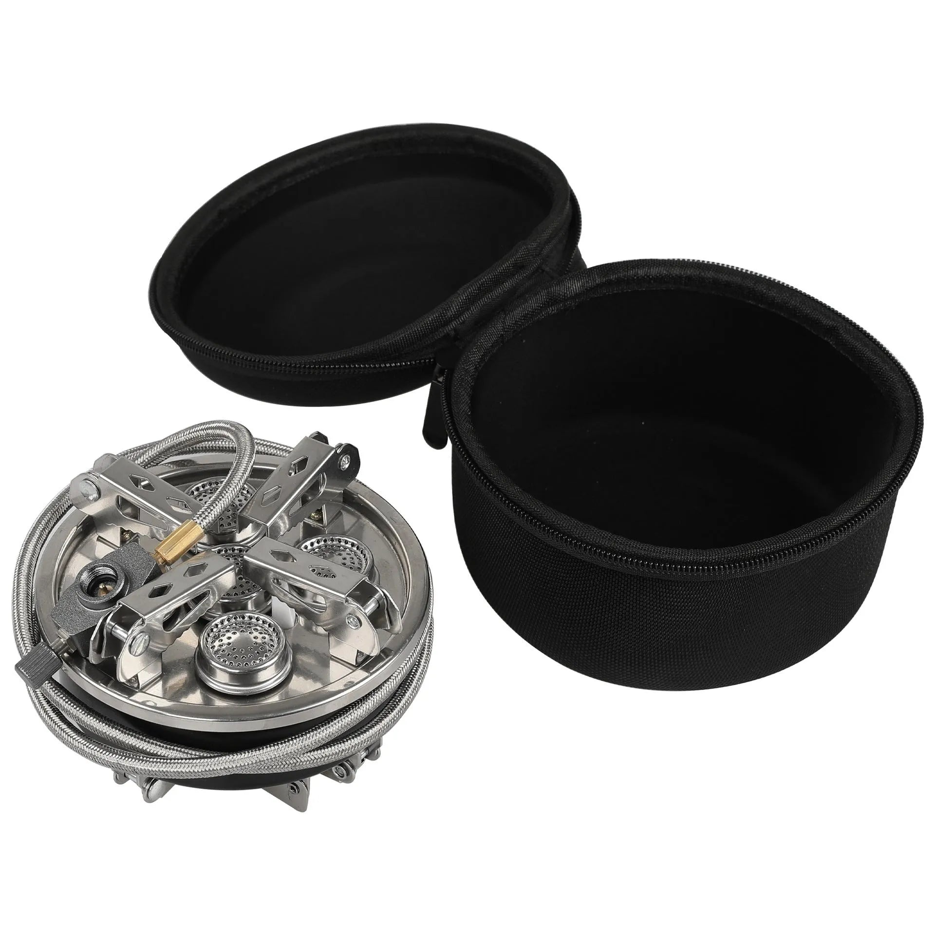 Silver portable split camping stove with foldable legs and a long black hose, on a grass background.
