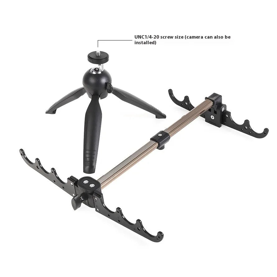 Silver aluminium tripod ice fishing rod holder bracket on ice.