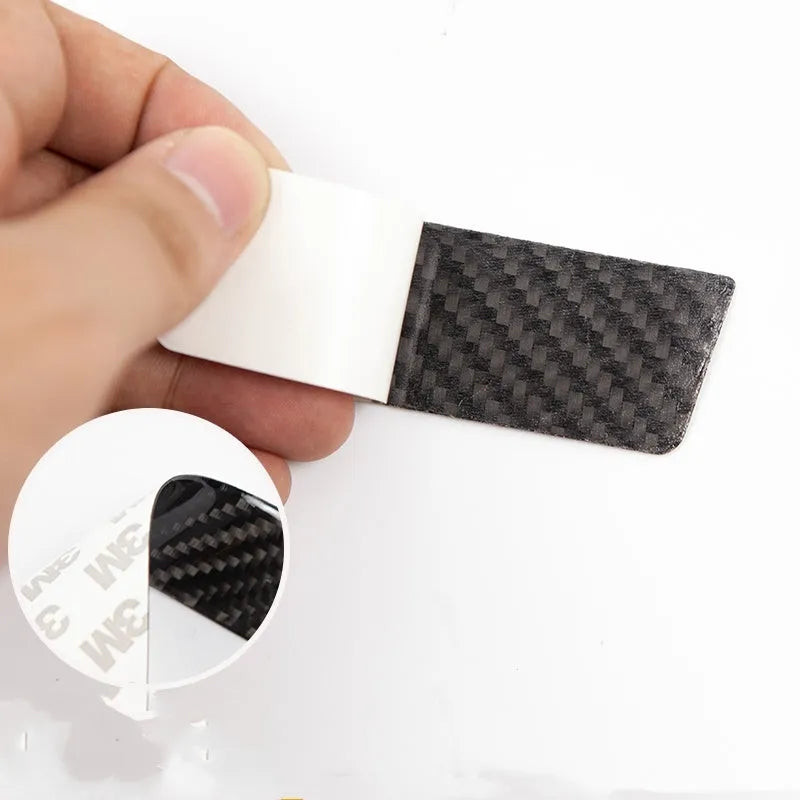 Four carbon fibre door handle protection stickers for Tesla Model S with adhesive backing
