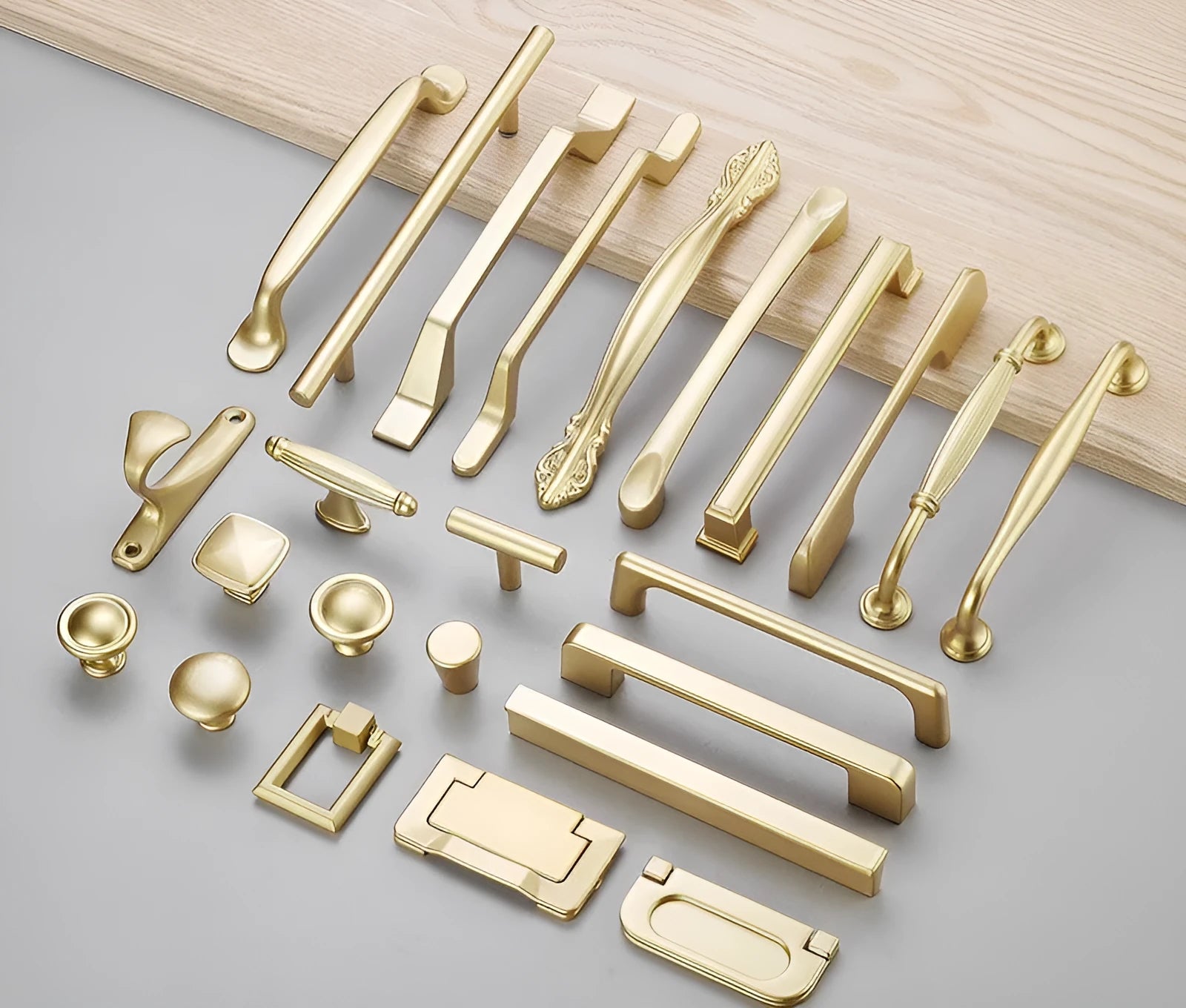 Gold aluminium alloy T-shaped open cover cabinet door handle for single hole mounting.