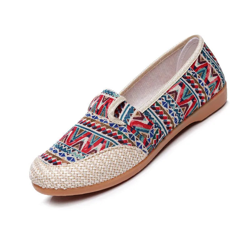 Women's ethnic style cloth shoes with colour stitching, cotton lining, and flat heel in shallow mouth design