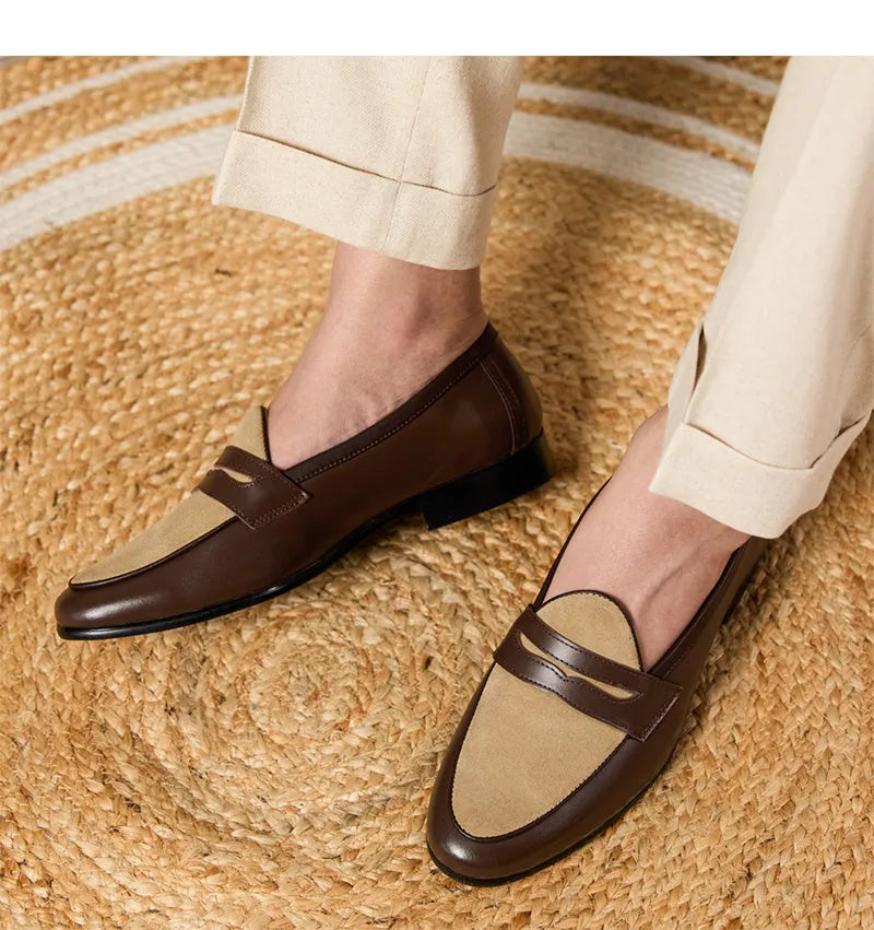 Coffee grey men's suede loafers with high-gloss finish and rubber sole on a plain background.