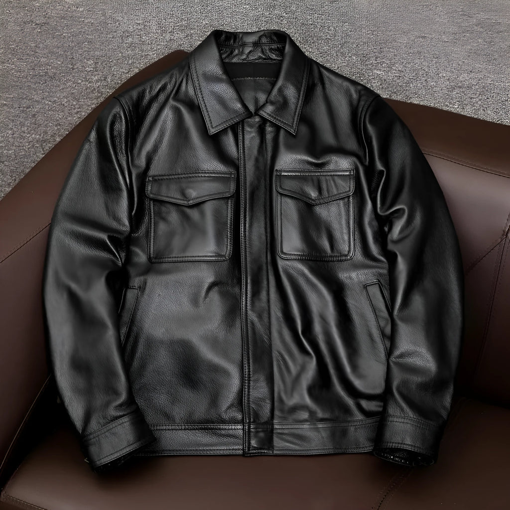 A man's black lapel short leather jacket with side pockets, shown in a loose fit.