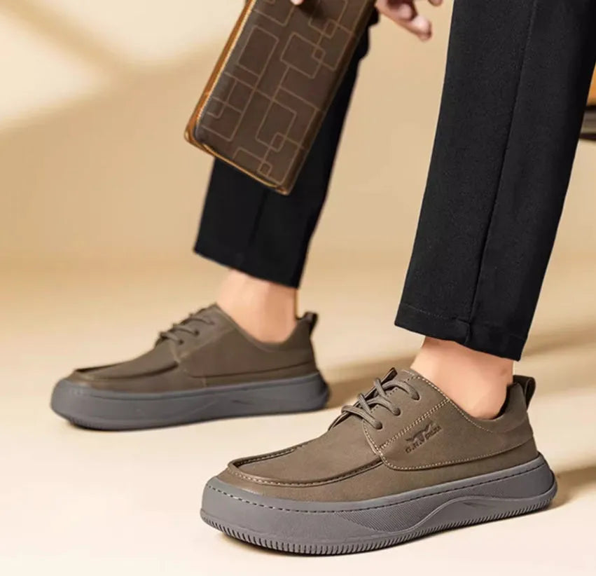 British retro style brown leather casual shoes with big toe design on a white background.