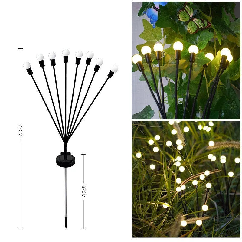 Solar-powered LED garden light with multiple heads on a stainless steel stake, placed in soil.
