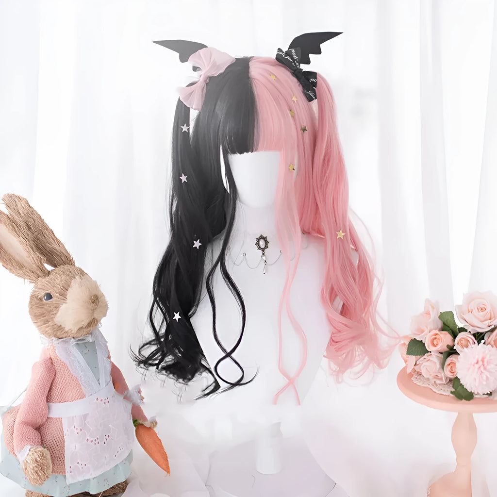 Harajuku Japanese Lolita style long curly black and pink wig with bangs on a wig stand.